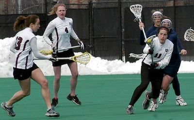 Cover image for Harvard Holds Off Terriers in Overtime Thriller