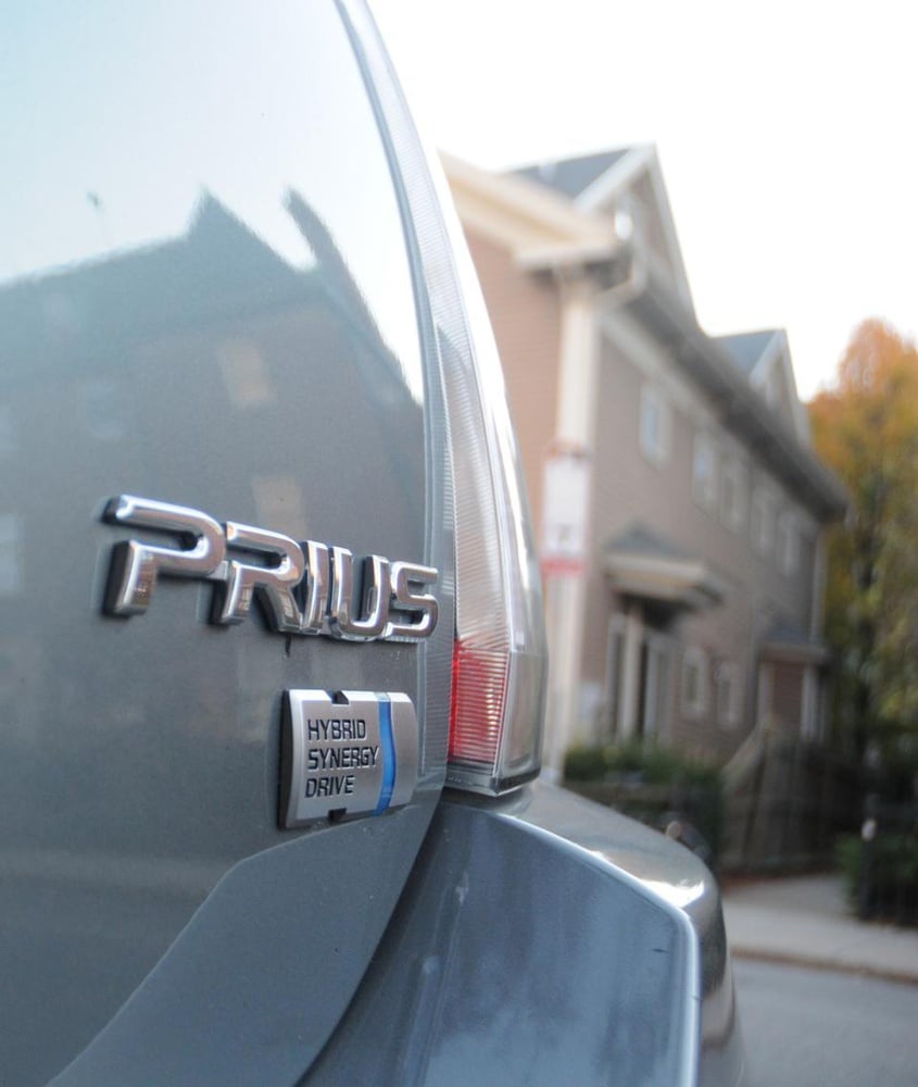 A Prius hybrid parked on Mt. Auburn St.