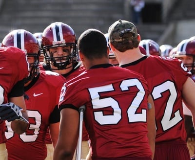 Cover image for Football Hats Make Statement, Show Support
