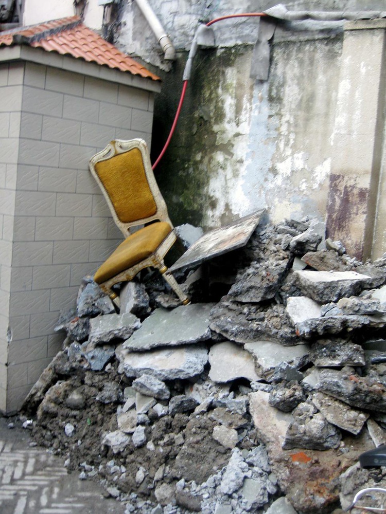 An elegant pile of garbage in one alleyway.