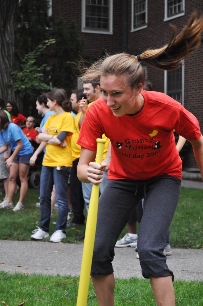 Jamie Olson ‘11 plays “dizzy bat” in Quincy courtyard yesterday as part of Quincy House Field Day 2010.