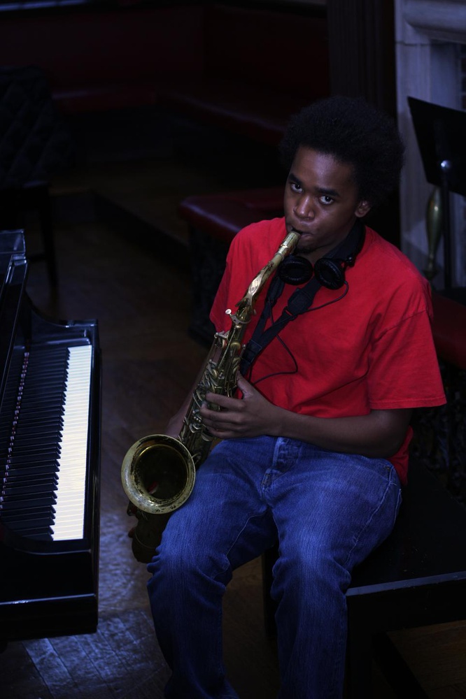 Kazemde George is a saxophone player, composer, and member of the band Love Exchange. 