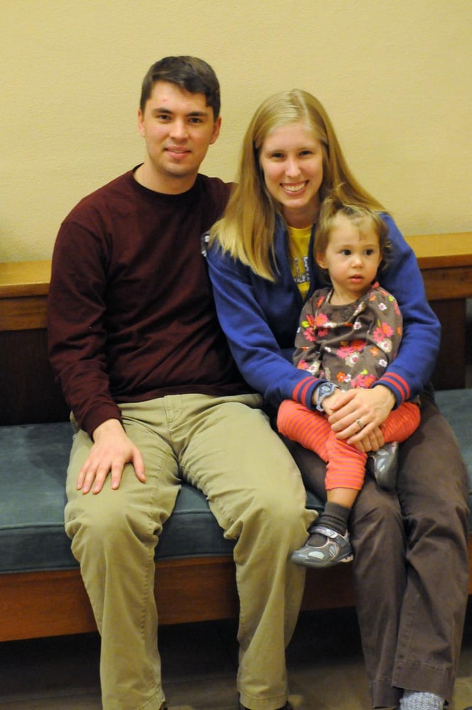 The McGinnisses are both undergraduates, he at Harvard and she at Wellesley. The couple takes a break from studying for final exams to play with their two year old daughter, Sophie.