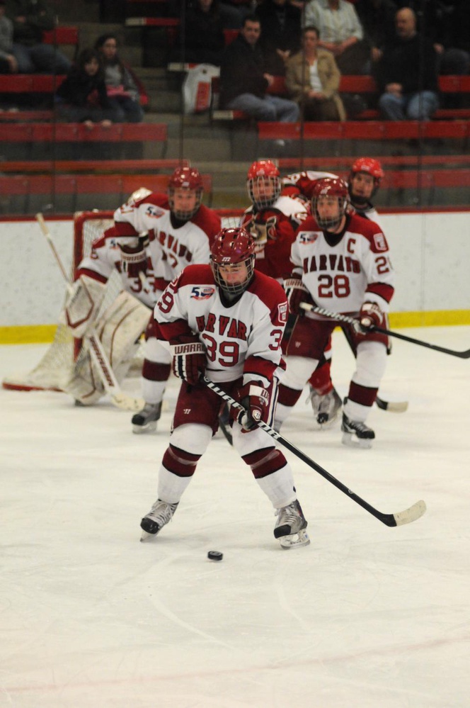 Pier-Olivier Michaud, pictured above in earlier action, and his fellow six seniors on the Harvard men’s hockey team have formed a strong bond beyond the rink during their years in Cambridge. 