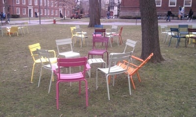 Cover image for Brightly Colored Chairs Return to the Yard