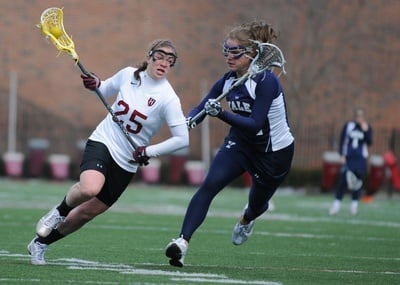 Cover image for Tetreault’s Five Scores Lead Crimson to Late Victory