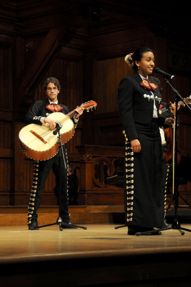 Natali Alcala Moreno '12 and Julian Moll-Rocek '12, senior members of Mariachi Veritas de Harvard, perform at the 2012 Senior Class Talent Show on Wednesday evening.