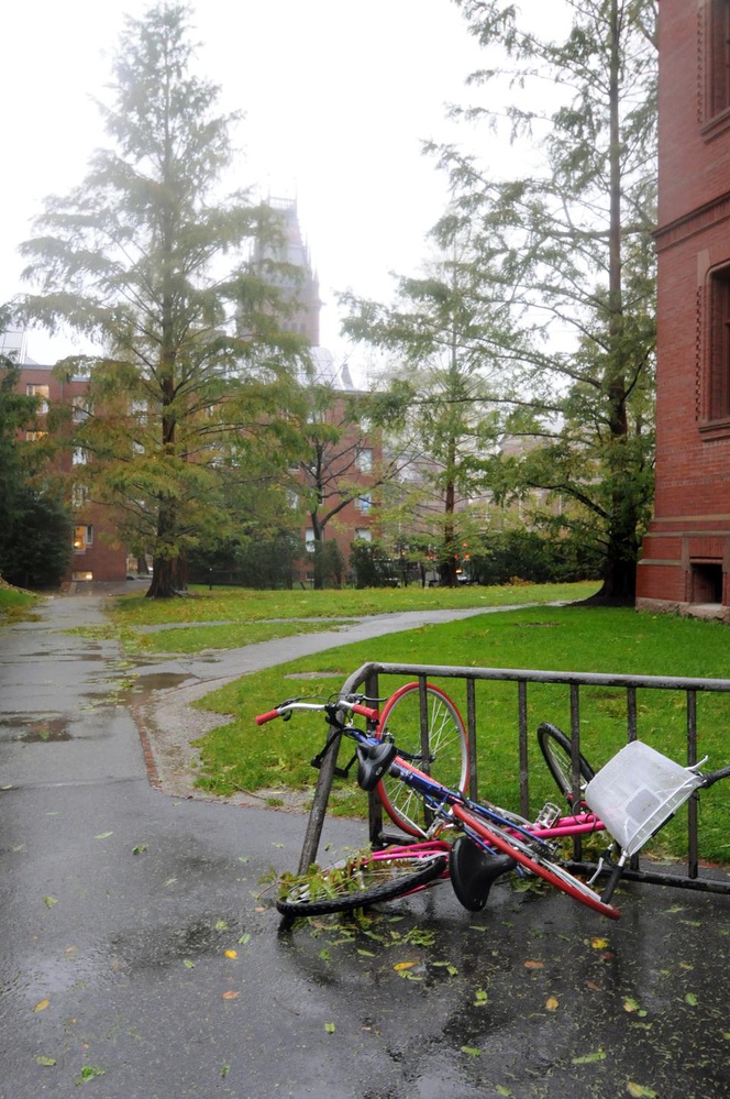 The high winds of Hurricane Sandy knock over a bike outside of Sever Hall. 