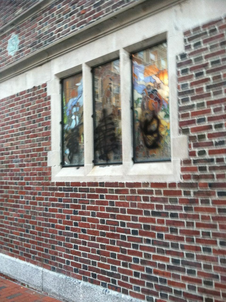 Graffiti on the window of the Harvard Lampoon, a semi-secret Sorrento Square social organization that used to occasionally publish a so-called humor magazine. 