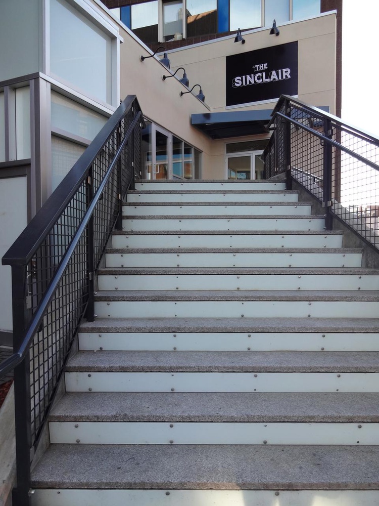 The Sinclair is located at 52 Church Street, right above Dado Tea.