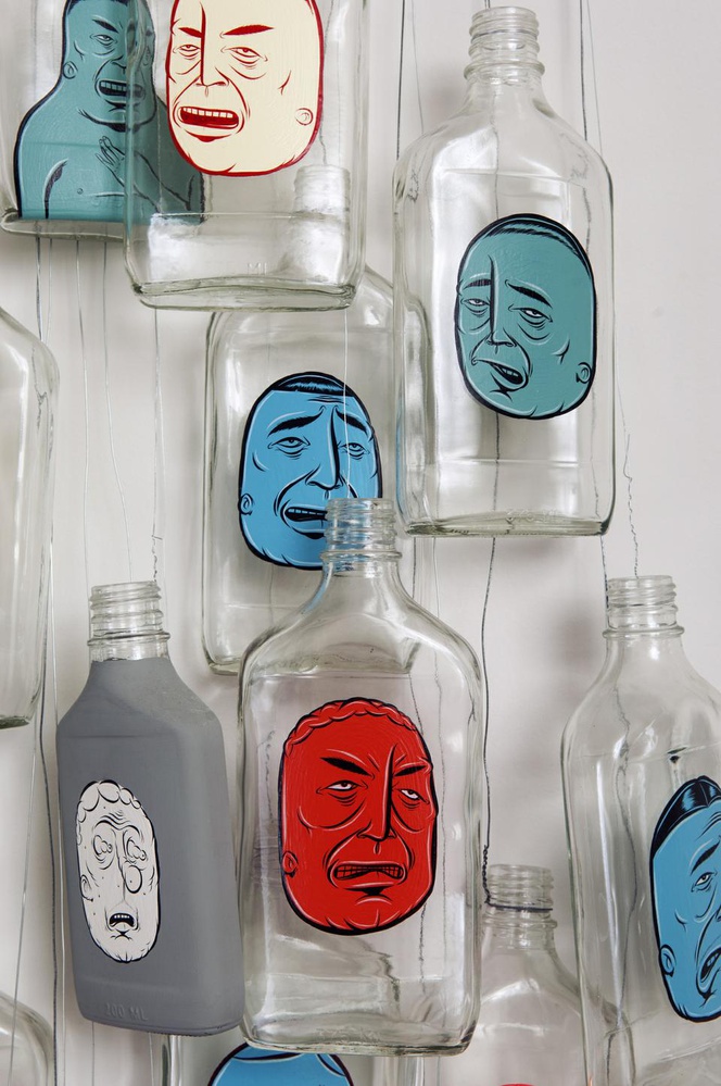 Barry McGee’s 2005 work “Untitled” features acrylic images on glass bottles, which are then hung on wires. Though McGee began as a graffiti artist, he has since produced many works for galleries.