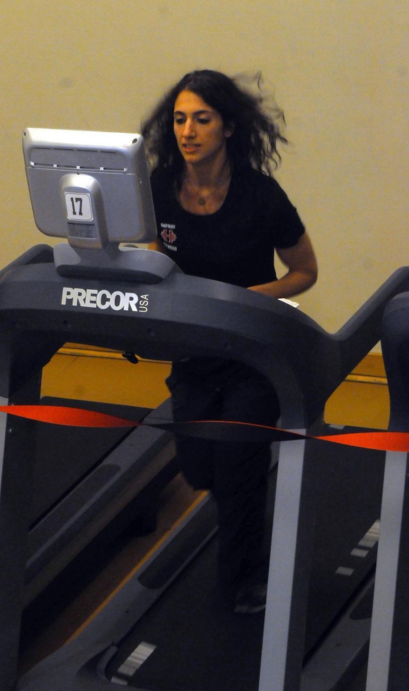 Nicole M. Pizzi runs on a Hemenway Gymnasium treadmill at the “Run for Boston” event on Wednesday, held to benefit the victims of the Boston Marathon bombings.  Hemenway rented out all of its treadmills for the event, with all proceeds given to One Fund, the official charity set up by Governor Deval Patrick to help survivors of explosions.