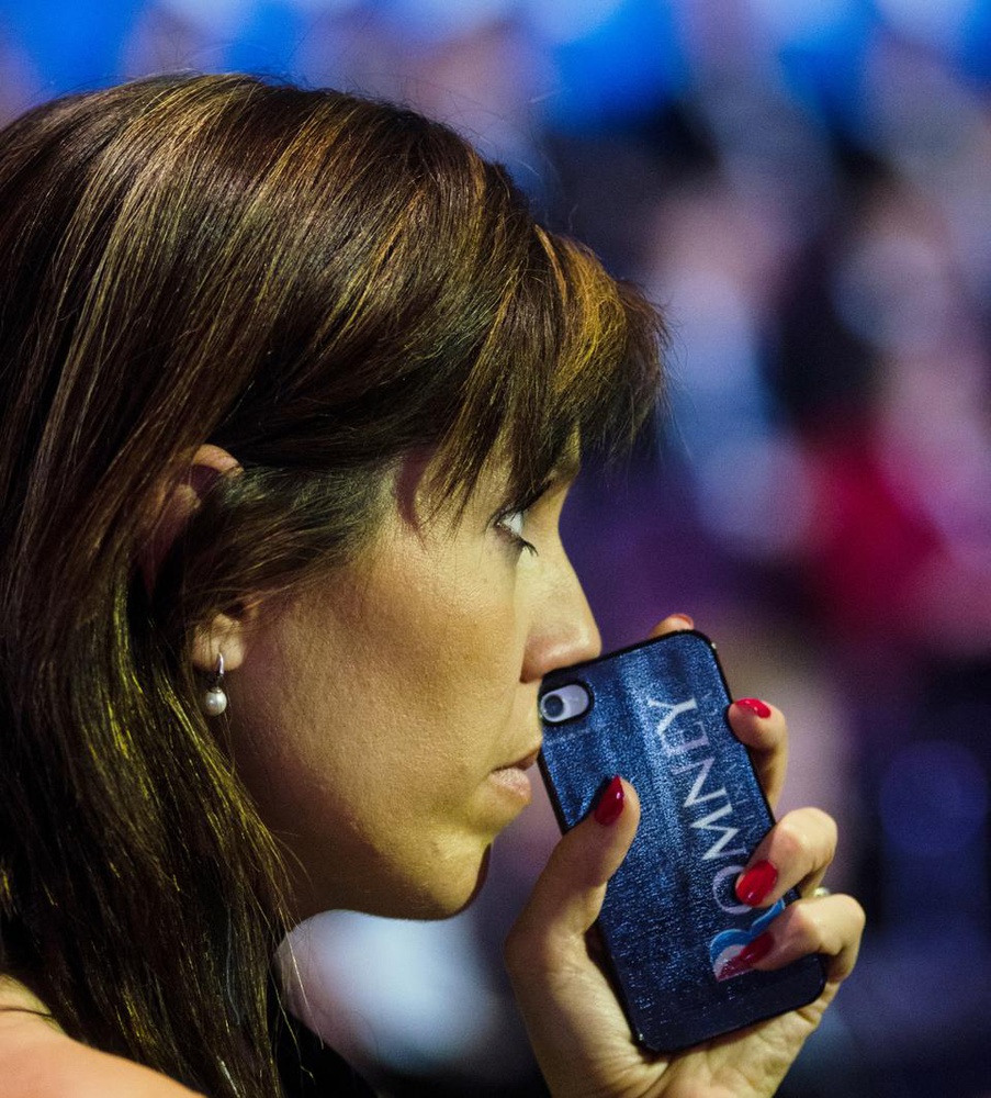 Romney supporters anxiously wait for incoming presidential election results at the Boston Convention and Exhibition Center. Romney conceded the election on November 7. 
