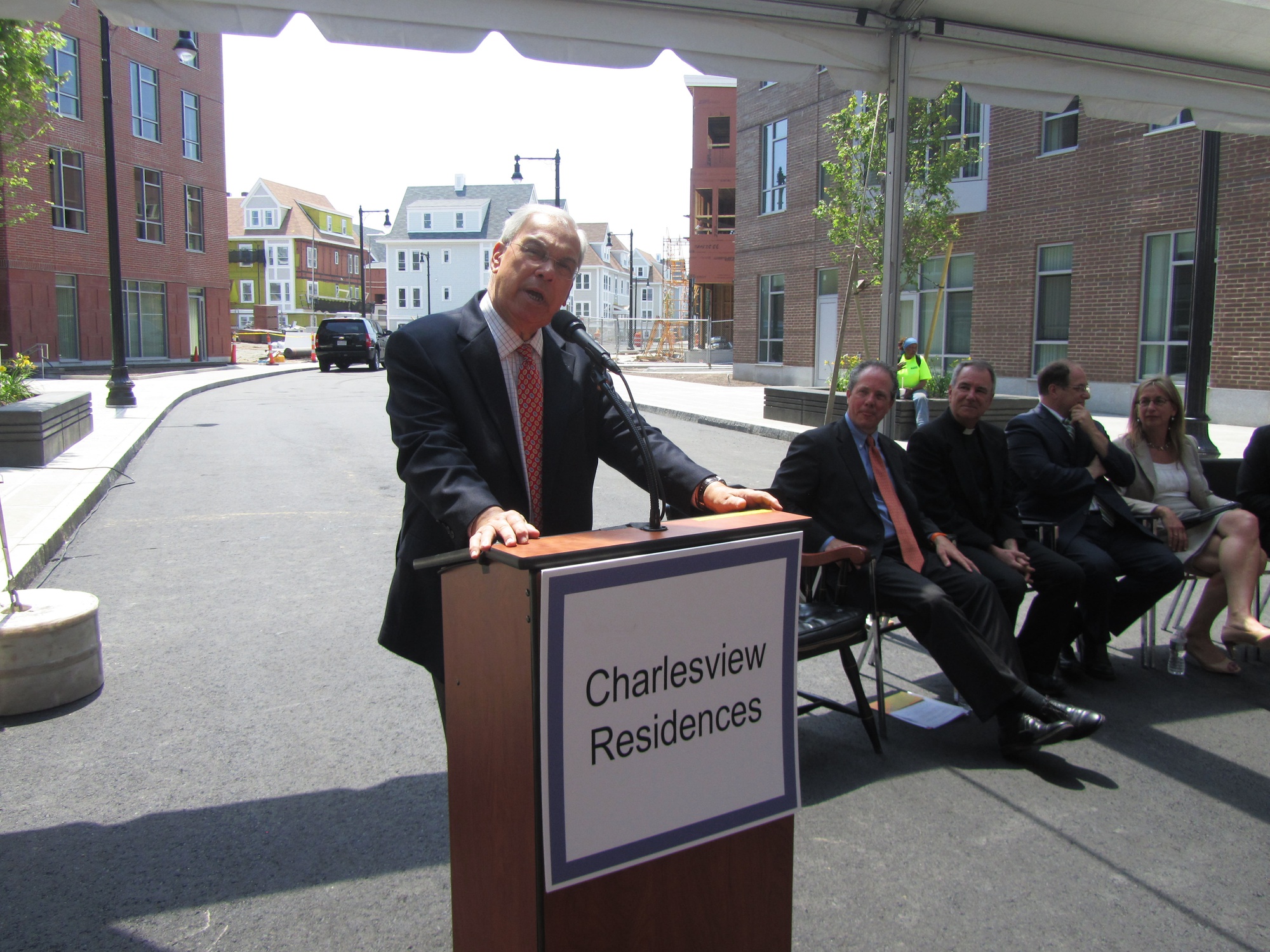 Boston mayor Thomas M. Menino delivers remarks before the ribbon-cutting ceremony at the opening of the new Charlesview Residences apartment complex in Allston-Brighton on Friday.