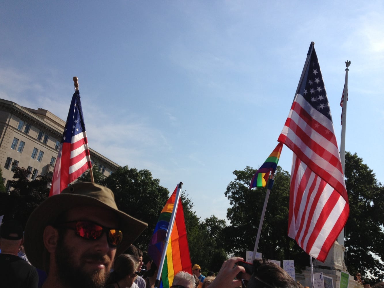 American flags and rainbow flags dot the crowd that included many supporters of same-sex marriage outside the Supreme Court building in advance of the court's gay marriage rulings in June 2013.