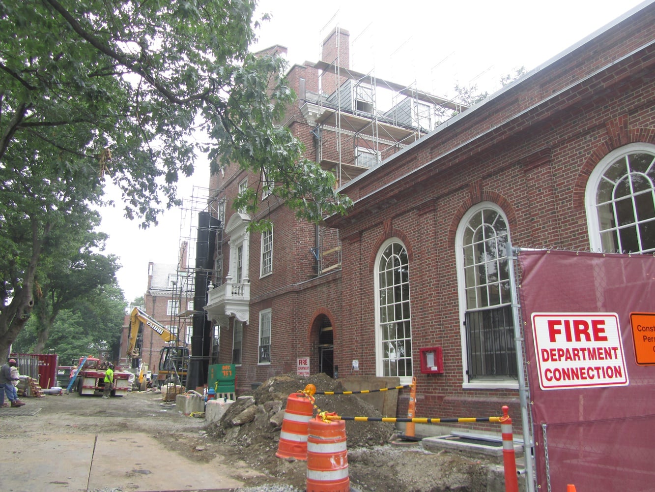 Old Leverett House stands amid construction on June 27. The renovation of McKinlock Hall has been underway since immediately after Commencement, according to Faculty of Arts and Sciences spokesperson Colin Manning. 