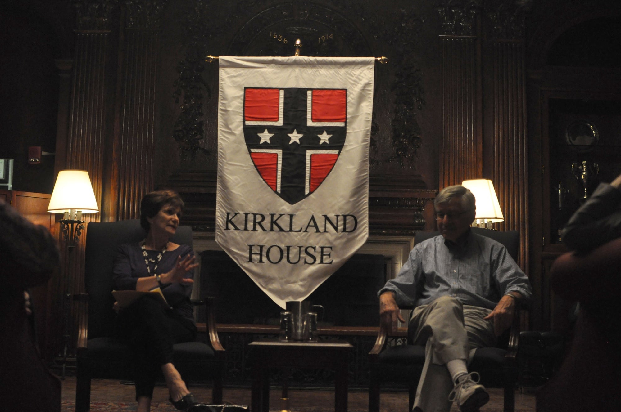Michael Dukakis, the 1988 Democratic nominee for president, speaks with students and associates of Kirkland house on Wednesday night.  