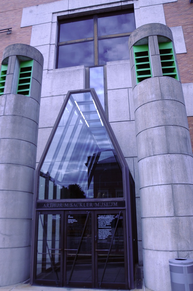 These modern geometric glass doors mark the entrance to the Arthur M. Sackler Museum. 