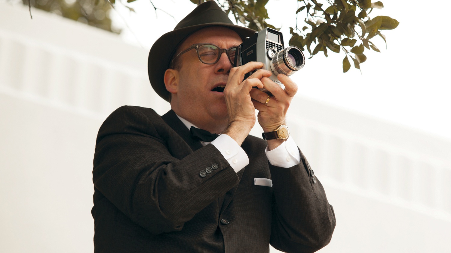 Paul Giamatti plays amateur cameraman Abraham Zapruder in Peter Landesman’s “Parkland,” which examines the assassination of John F. Kennedy ’40.