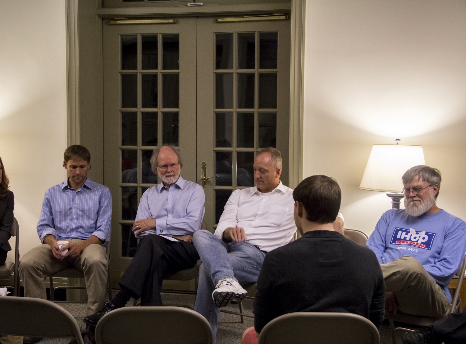 Dean of the Faculty of Arts and Sciences Michael D. Smith and faculty members held a discussion with students regarding the next Dean of the College in Pforzheimer House.