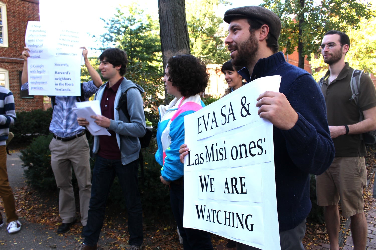 Protesters gather outside President Faust's office on Friday afternoon demanding justice at Harvard's timber plantations in Argentina.  The Responsible Investment at Harvard Coalition reports that Harvard's two timber plantations in Argentina are endangering the Ibera wetlands and thousands of farmers.