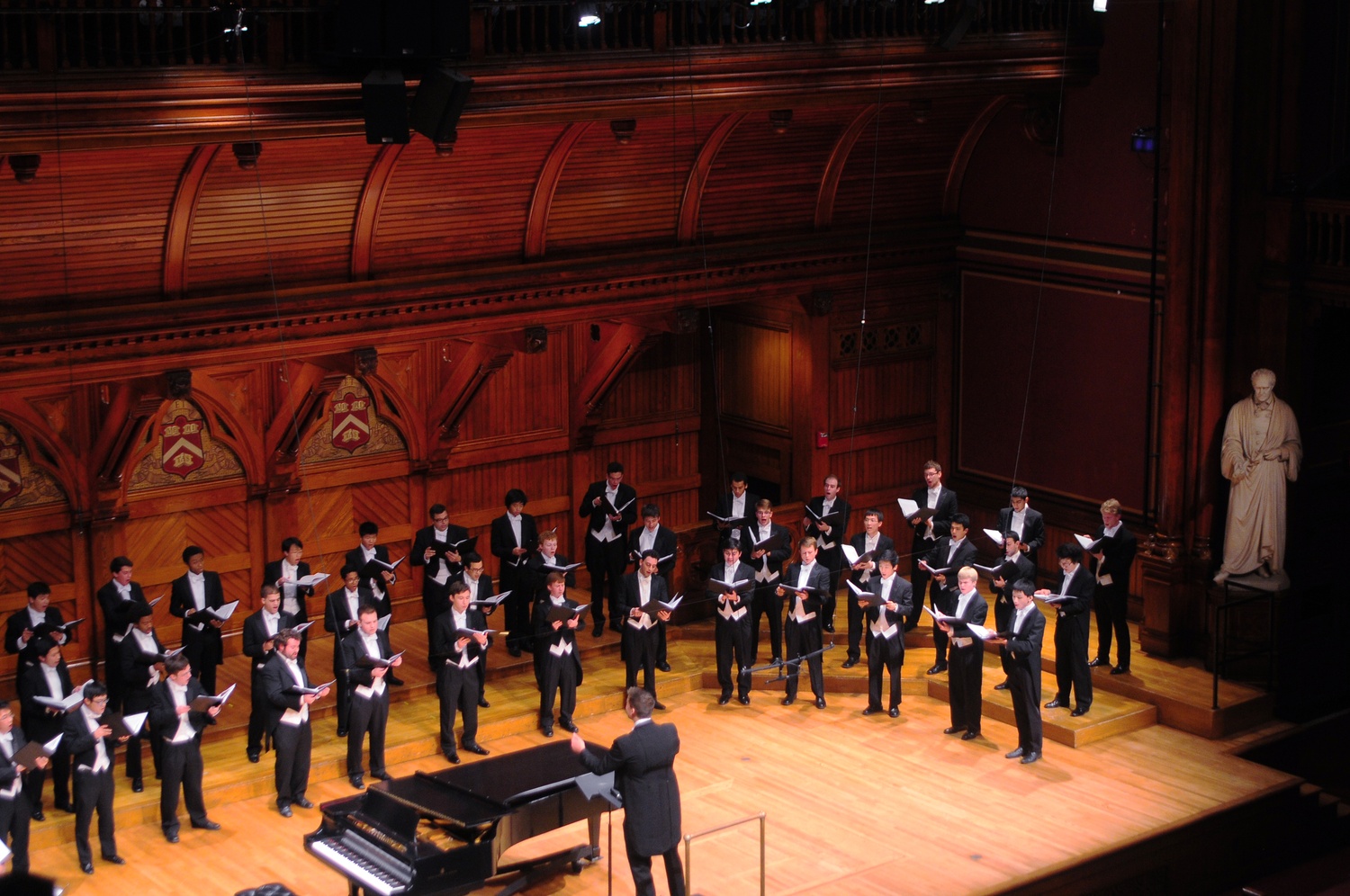 A performance of the Harvard Glee Club in Sanders Theatre in 2013.