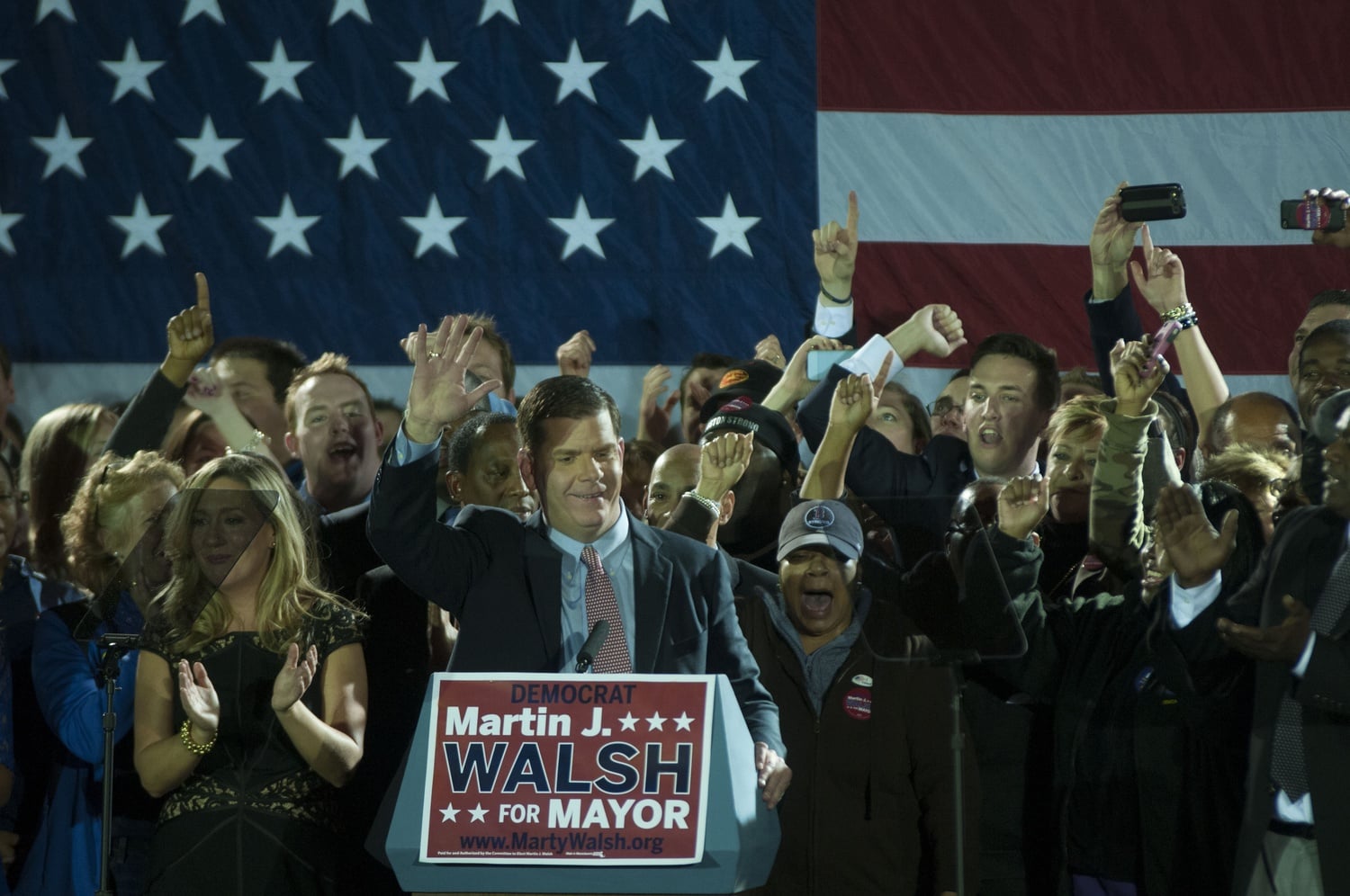 Dorchester Democrat Martin J. Walsh waves to supporters after defeating John R. Connolly ’95 to become Boston’s new mayor. 