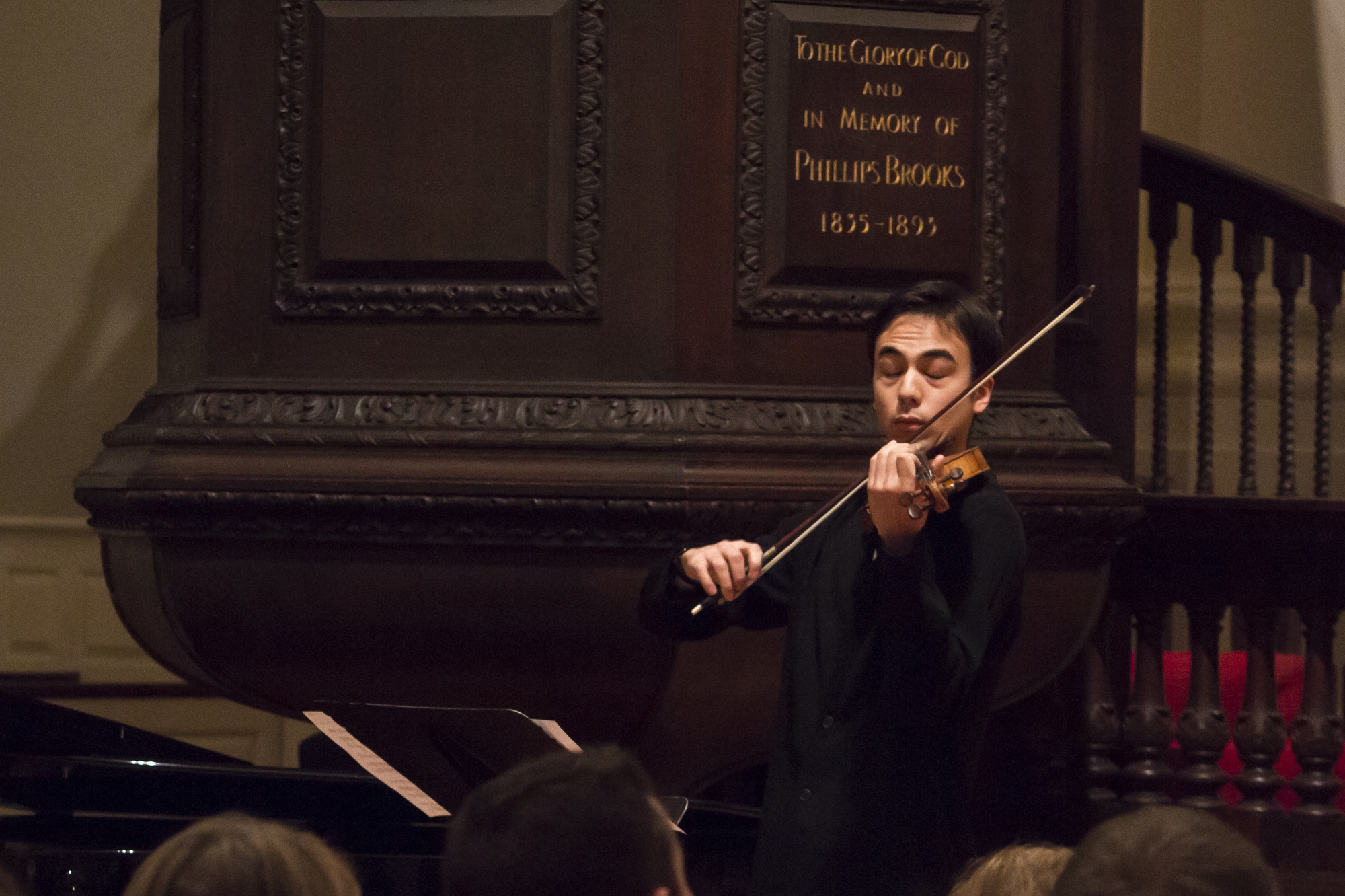 Keir D. GoGwilt, a postgraduate fellow, plays a song during Seamus J. Heaney’s memorial service at Memorial Church. Semuas J. Heaney, a former Harvard professor, won the 1995 Nobel Prize in Literature and passed away Aug. 30, 2013 in Dublin, Ireland.