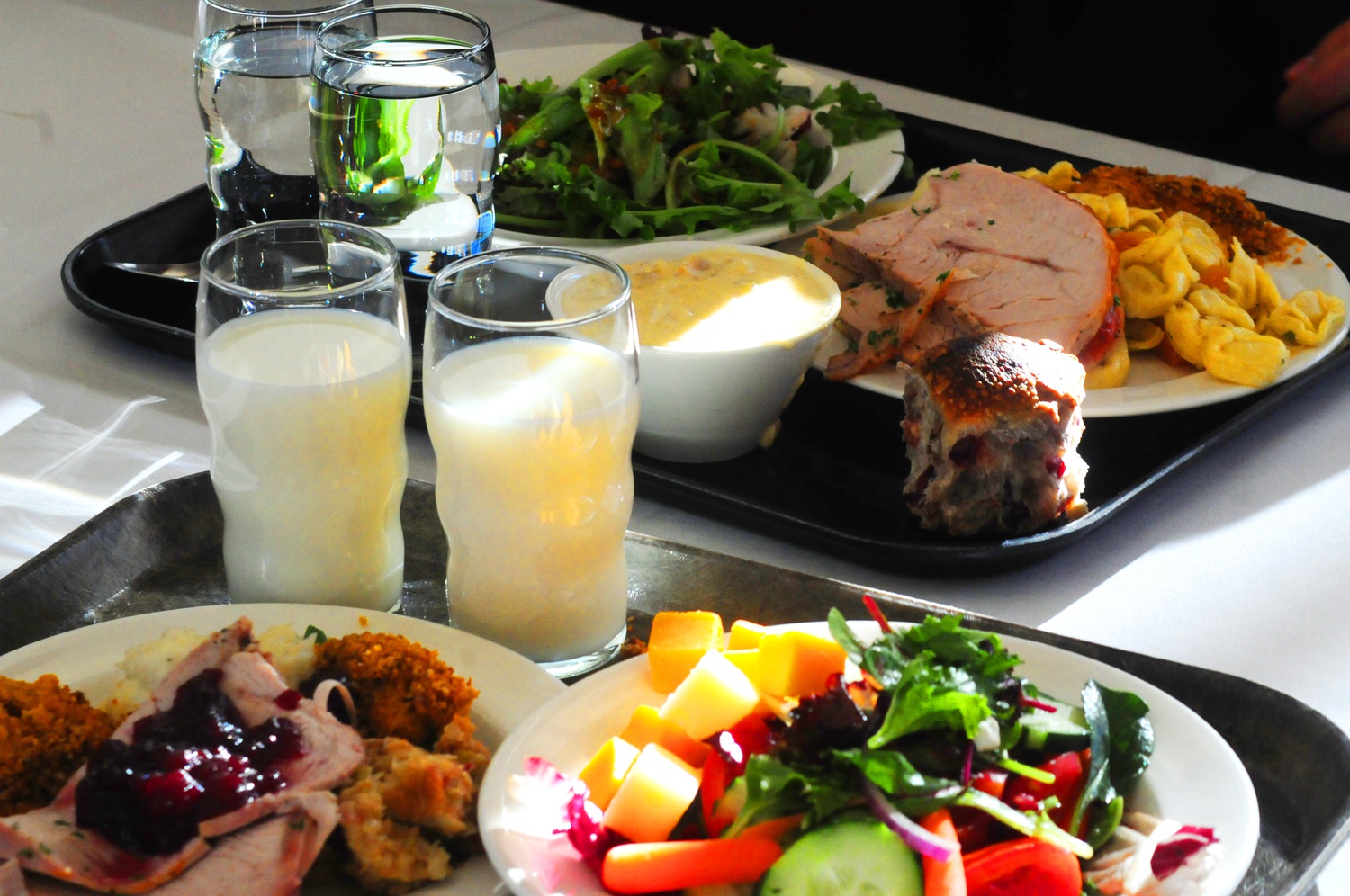 Harvard students enjoy a traditional Thanksgiving meal cooked and created by HUDS in Quincy House Dining Hall on Thursday from 12 to 6 PM.  