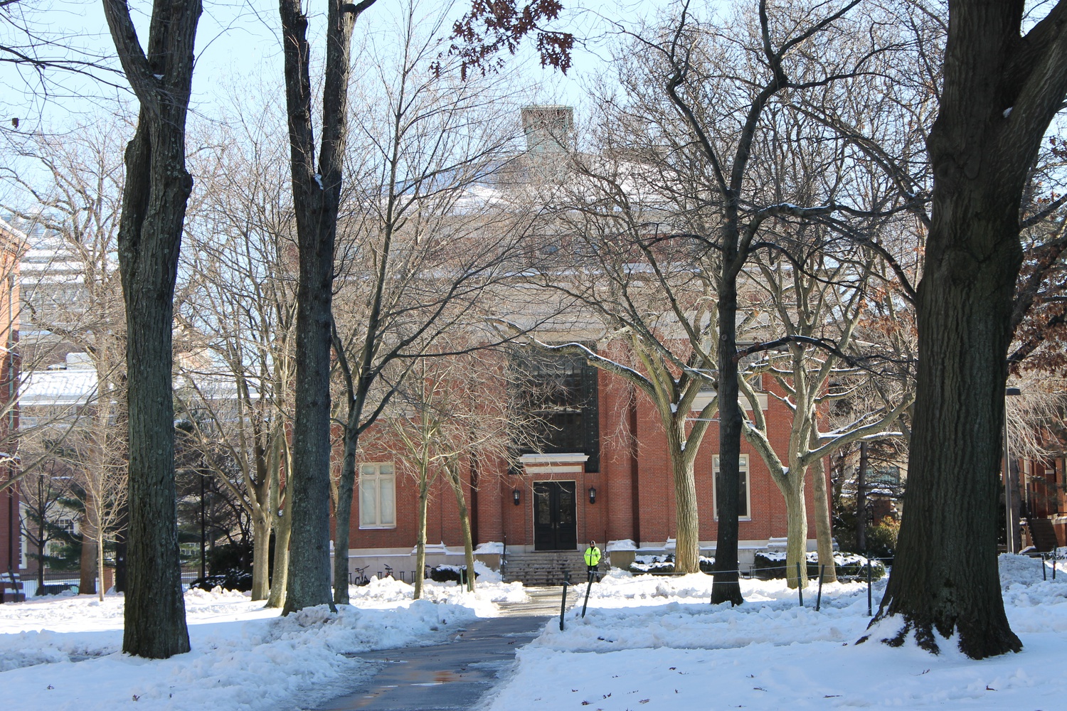 A lone police officer stands guard outside of Emerson Hall, one of the four buildings evacuated Monday morning.
