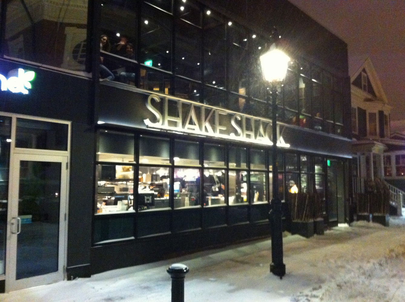 Shake Shack, Harvard Square's newest burger destination, remains open for its first full day of business Thursday despite a major winter storm impacting New England. 