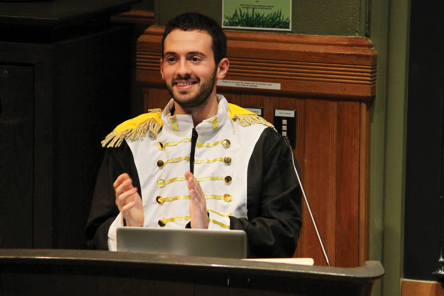 UC President Gus Mayopolous '15 applauds members of the Undergraduate Council for a successful first run of Ghost Protocol on Sunday night in Sever Hall.