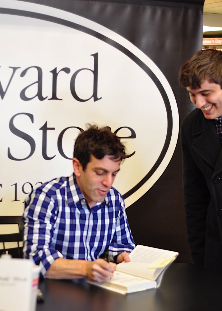 Author, B.J. Novak '01 greets a fan during his public book signing at Harvard Book Store on Feb 10. Novak was on campus to promote his new book, "One More Thing: Stories and Other Stories."