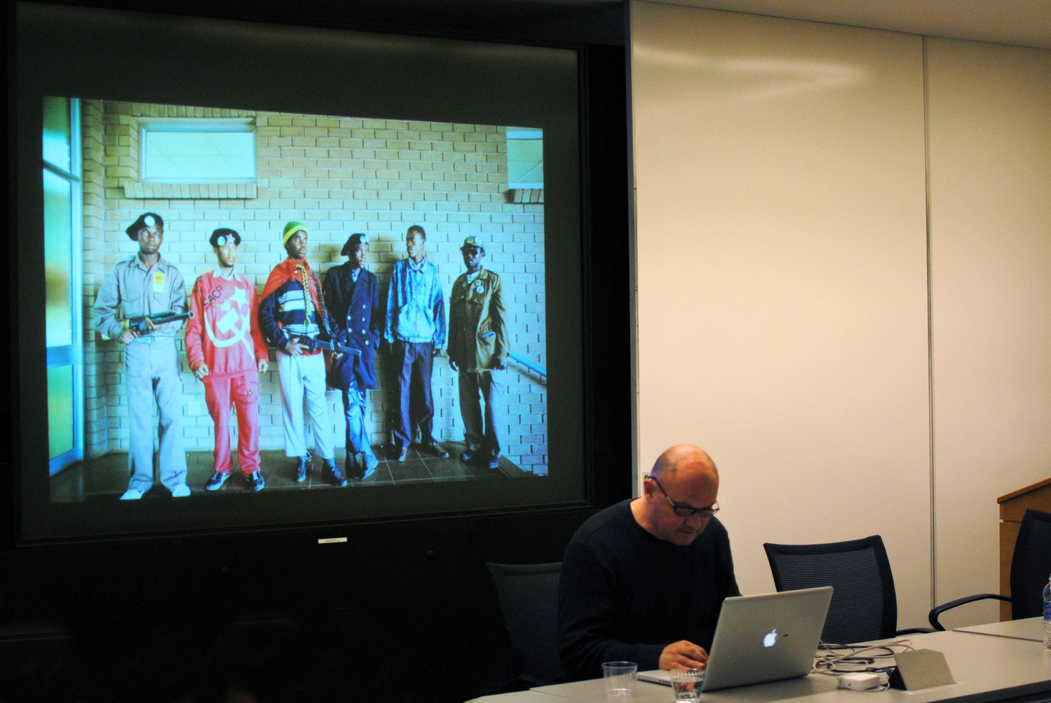 Greg Marinovich, Pulitzer Prize-winning photojournalist from South Africa and Nieman Fellow, presents a seven minute video compilation of his work at a seminar in CGIS Knafel Building on Feb 10. Marinovich explained how his work addresses the question: "How do we overcome conflict and the environment that gives rise to conflicts?"