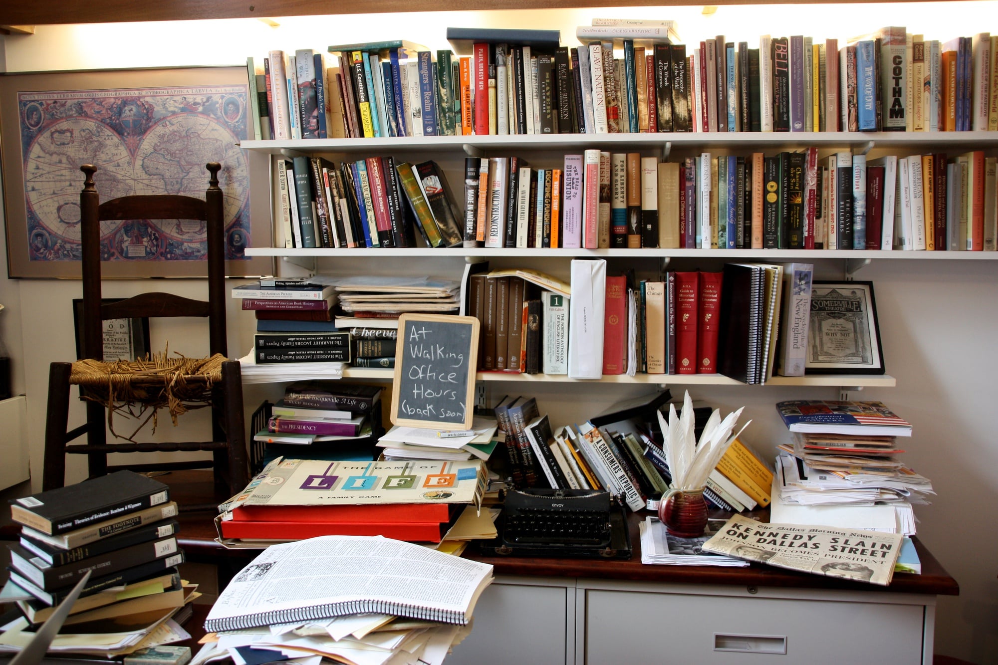The walls of Lepore's office are decorated with a variety of books, posters, and artifacts from significant time periods in American history.