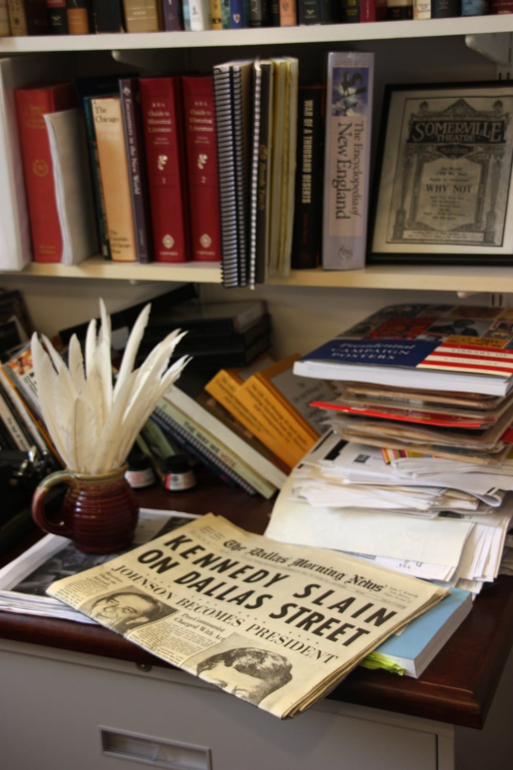 A copy of The Dallas Morning News issue the morning after President John F. Kennedy's assassination lies across one of the tables in Lepore's office.