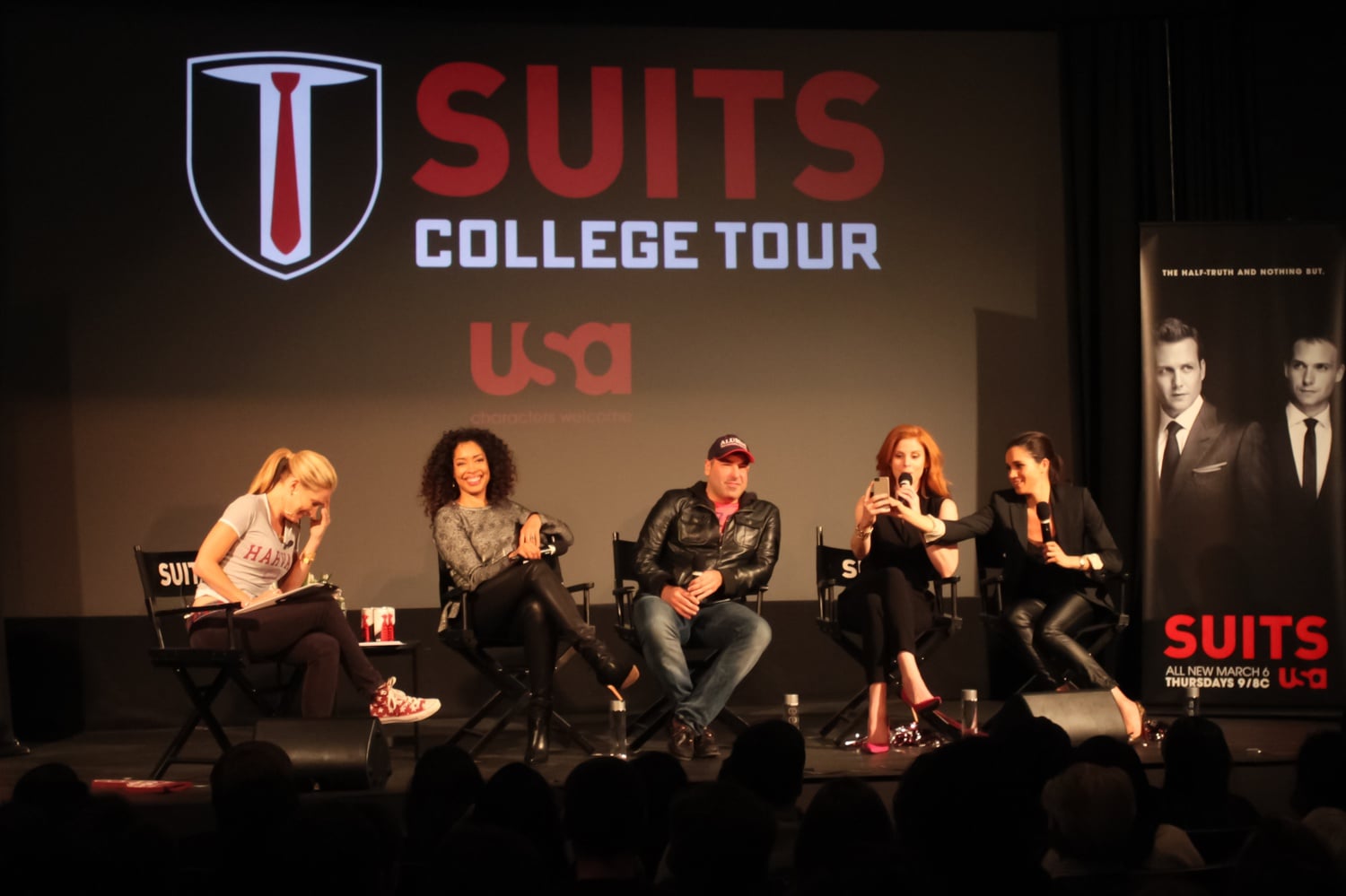 Torres, Hoffman, Rafferty, and Markle answer questions from the audience playfully.