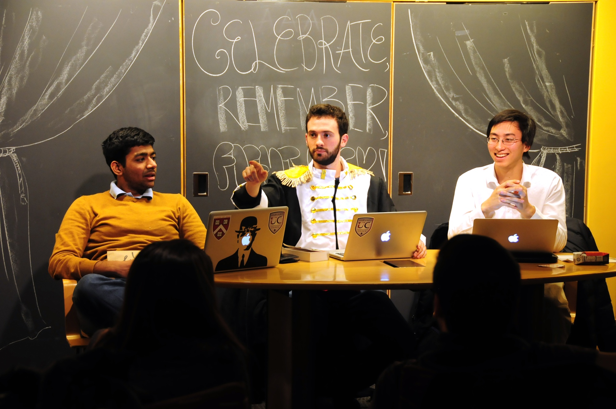 UC Treasurer Meghamsh Kanuparthy '16, left, President Gus A. Mayopoulos'15, center, and Vice-President Sietse K. Goffard'15, right, facilitate a discussion on the Council's progress in pursuing additional funding avenues.
