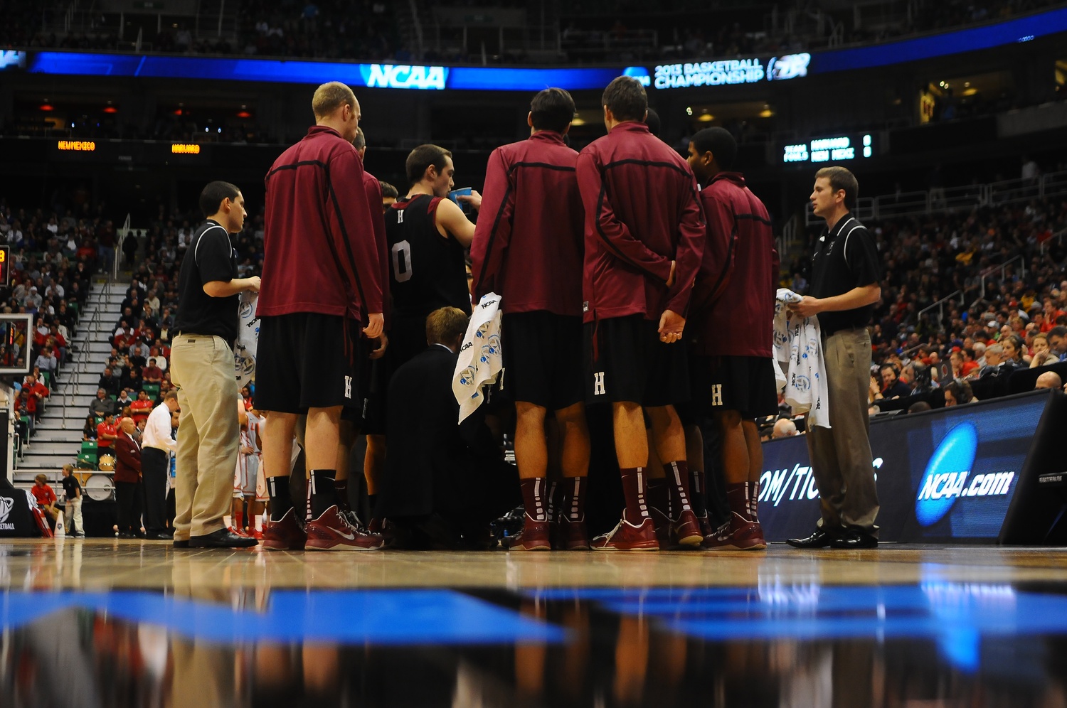 The Harvard men's basketball team gathers during a timeout of their opening game of the 2013 NCAA tournament. After winning the Ivy League regular season title, Harvard will return to the Dance next week.