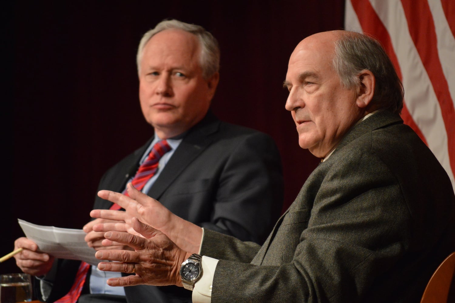 Charles A. Murray '65 speaks with moderator Bill Kristol '73 at the Institute of Politics in 2014.