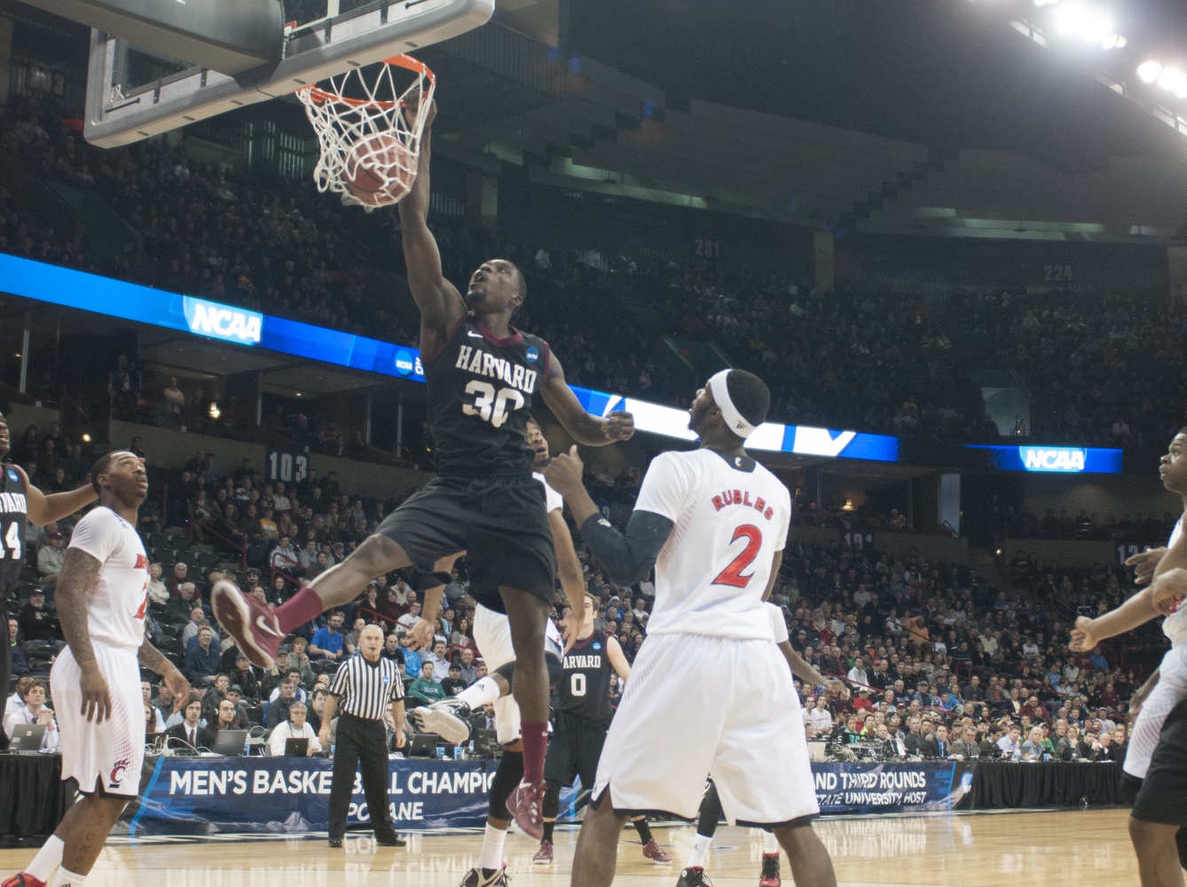 For the second consecutive year, the Harvard men's basketball team pulled off an upset. On Thursday, it defeated Cincinnati, 61-57, in the second round of the NCAA Tournament. 