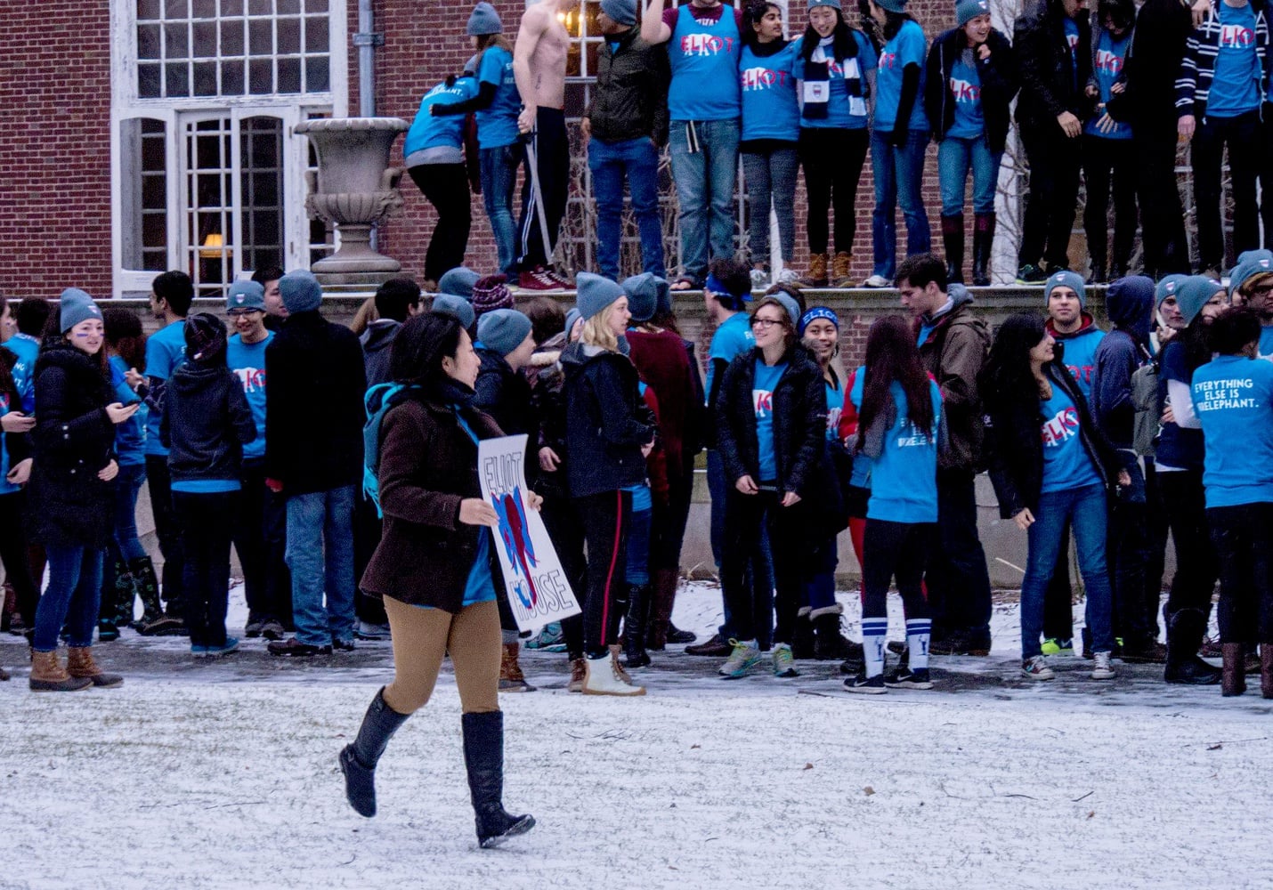 An Eliot House student prepares to storm the Yard on the morning of Housing Day.