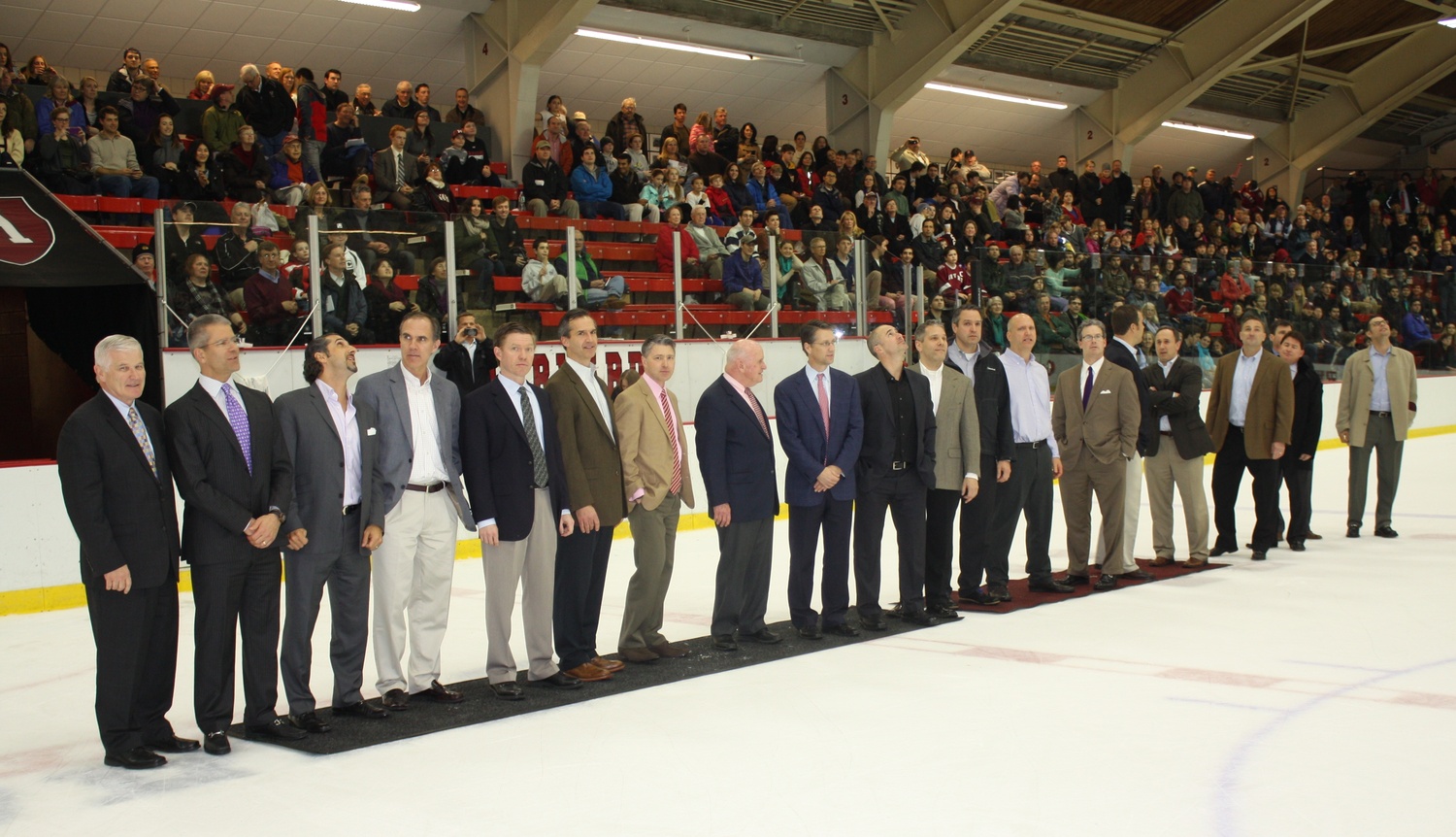Cleary and members of the '89 team are recognized at the Bright-Landry Hockey Center between periods of the Harvard-Yale game on Feb. 21, 2014.