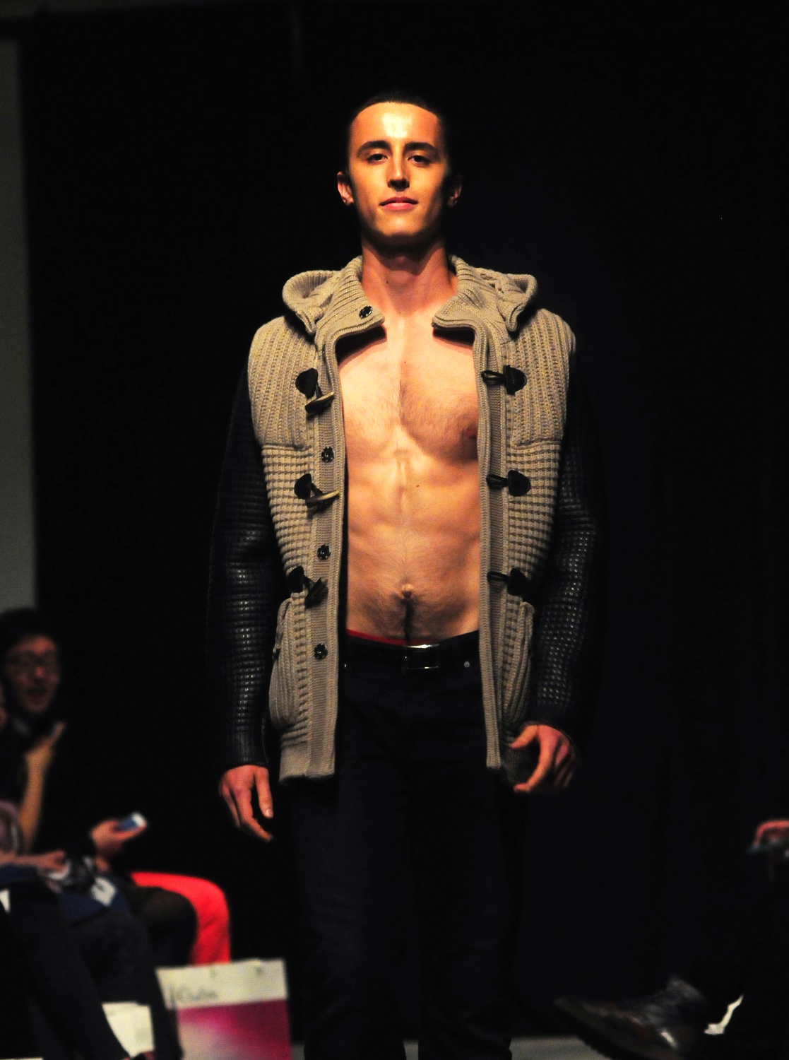 Harvard undergraduates strut down the catwalk of the annual Identities fashion show on Saturday evening in the Northwest Labs. Identities is a student-produced show founded in 2006 to showcase international designers from Paris to Japan. 
