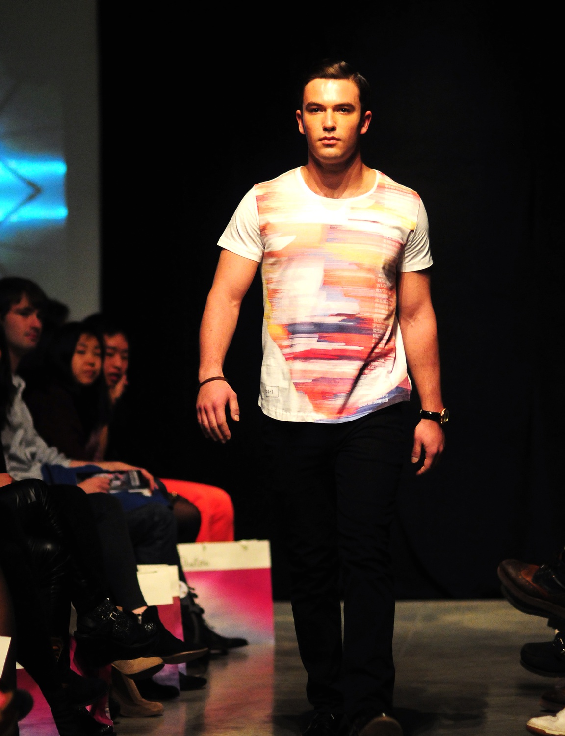 Harvard undergraduates strut down the catwalk of the annual Identities fashion show on Saturday evening in the Northwest Labs. Identities is a student-produced show founded in 2006 to showcase international designers from Paris to Japan. 
