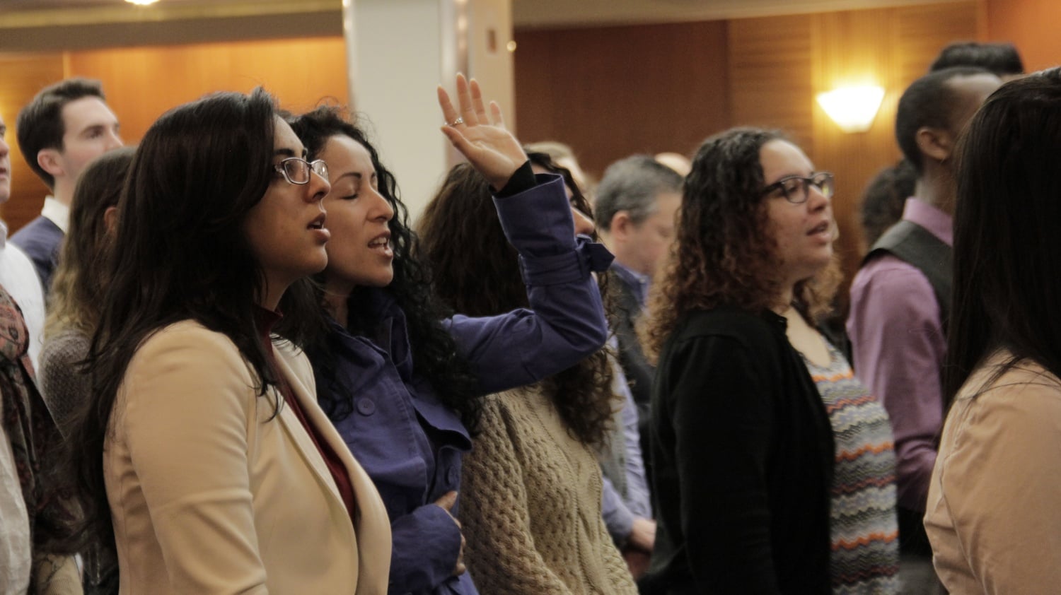 Members of the Boston Church of Christ sing at Sunday service on April 6.