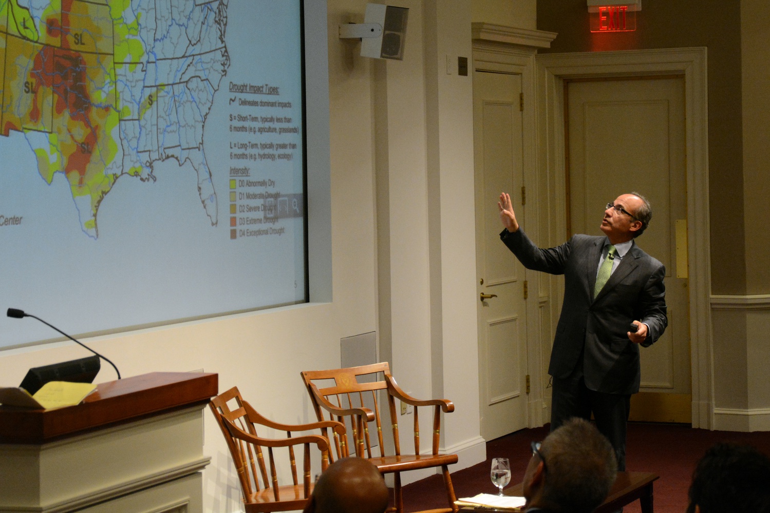 Felipe Calderon references a map of the United States while speaking at his lecture “Climate Change and Business” at Harvard Business School on April 4. 