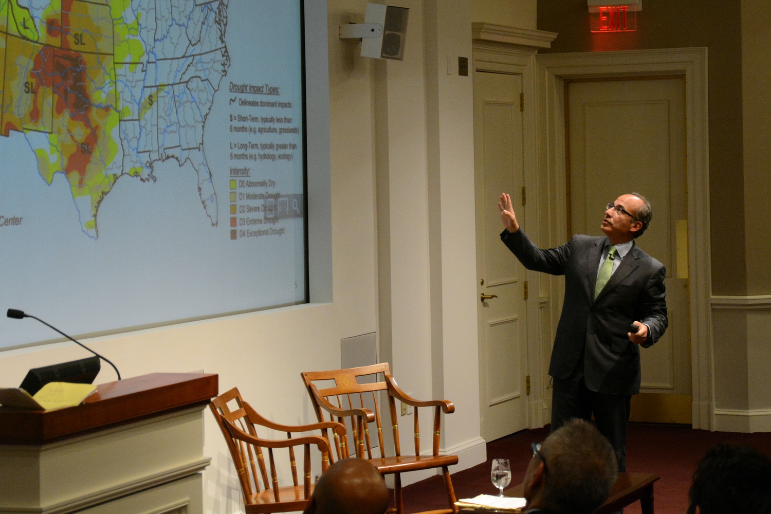 Felipe Calderon references a map of the United States while speaking at his lecture “Climate Change and Business” at Harvard Business School on April 4. 