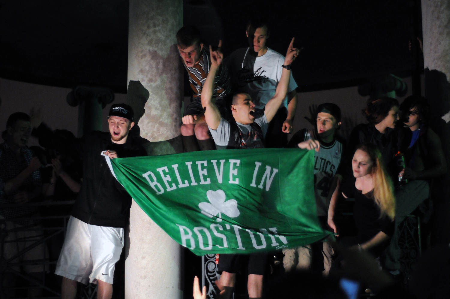 College students and area residents flood the Boston Common on Friday evening following the capture of suspect Dzhokhar Tsarnaev.