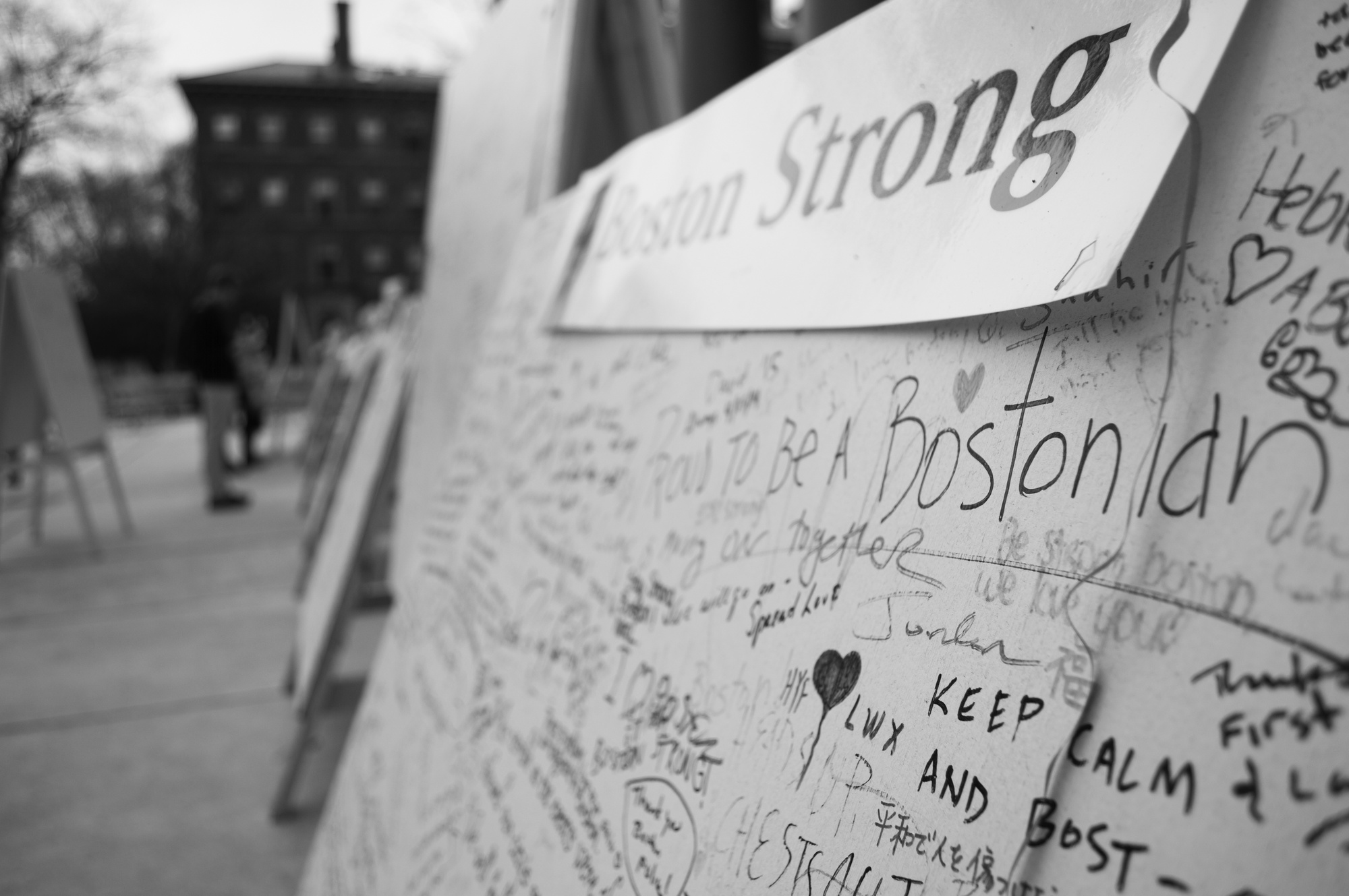 Handwritten messages line the remembrance walls brought out for the anniversary of the Boston Marathon Bombings. 